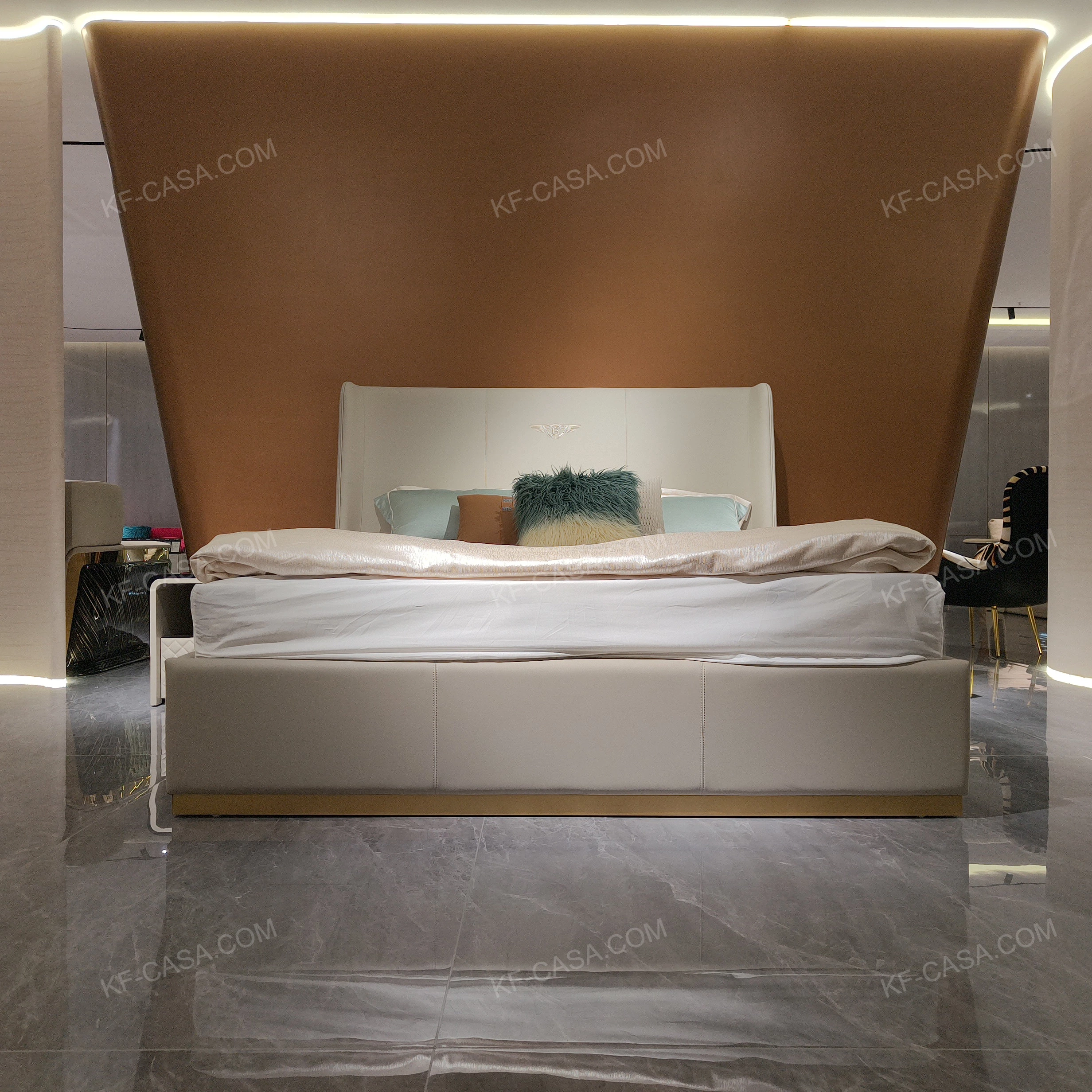 Light Beige Upholstered Bed with Brand Emblem & Gold Stainless Steel Base